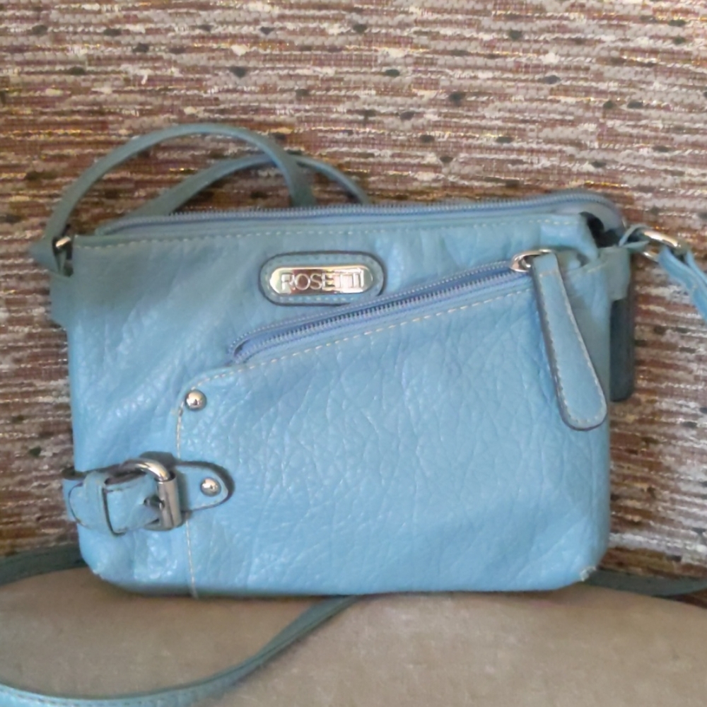 Rossetti small cross body in light blue.